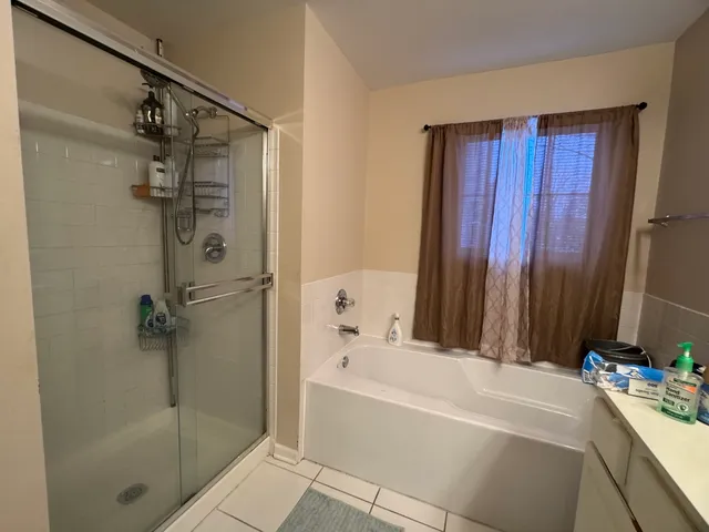 a bathroom with a sink and a bathtub