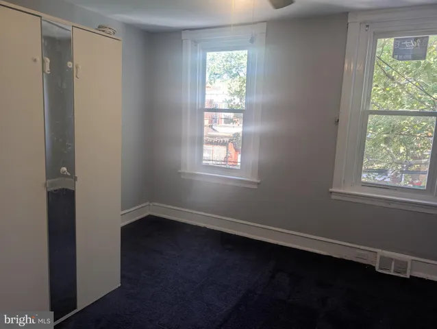 a view of stairs and a hallway