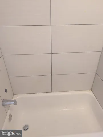 a brick house with a door and a door