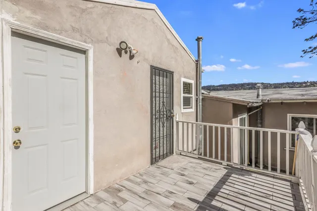 a view of a house with a terrace