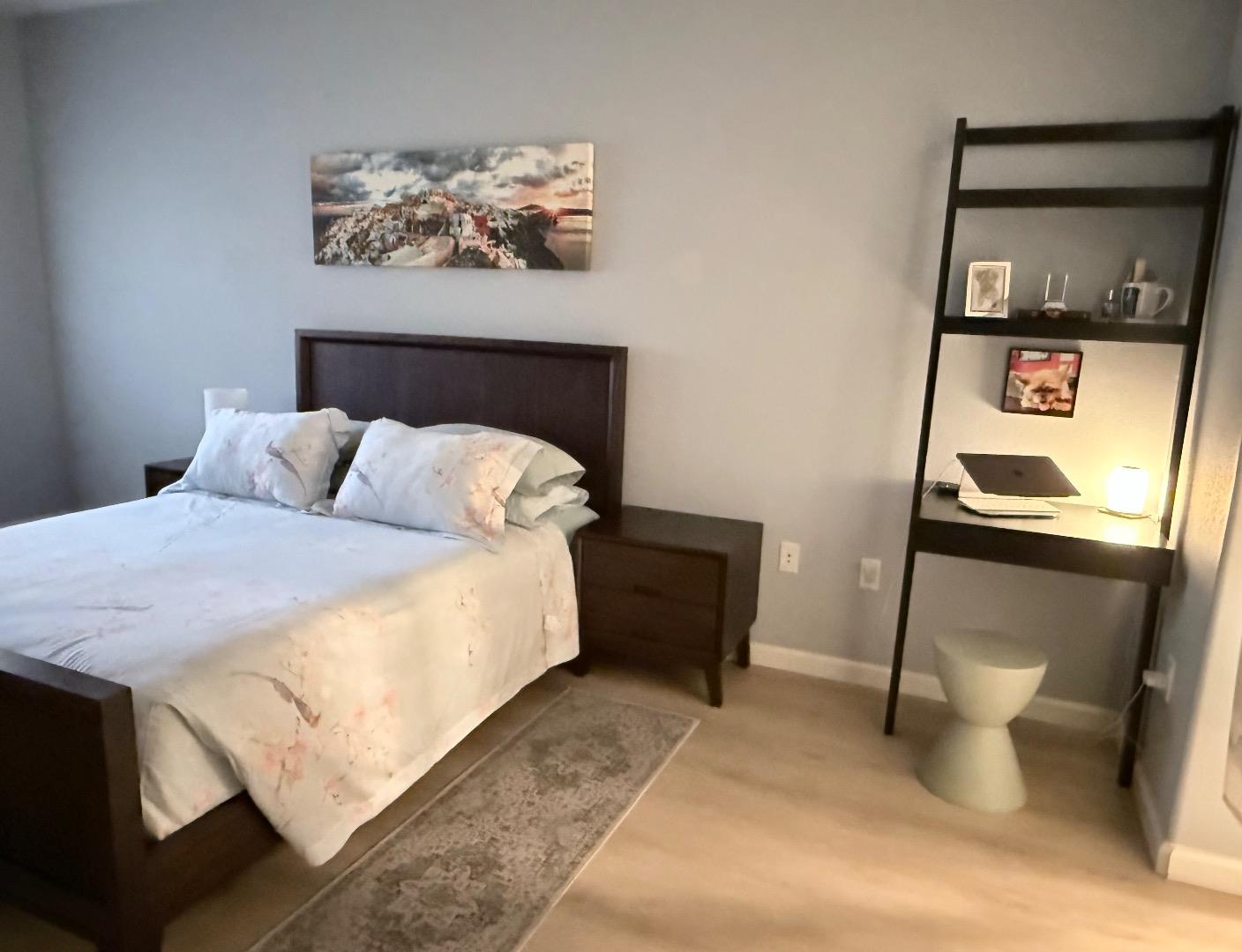 1310 Saddle Rack Street, Unit 347 San Jose, CA 95126 - Photo 20 of 42 a bedroom with a bed and furniture