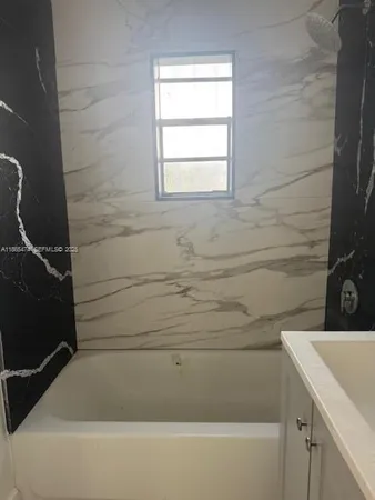 a bathroom with a bathtub