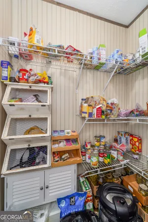 a room with storage and bicycles