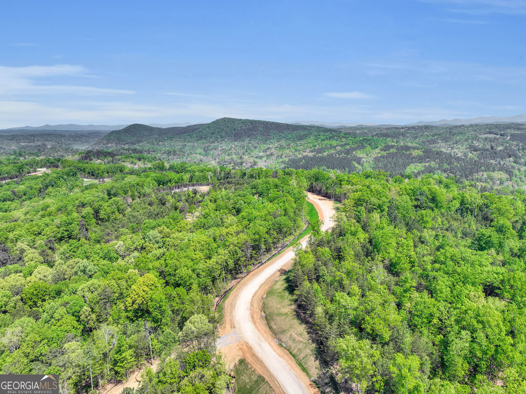 655 Lookout Valley Trail Talking Rock, GA 30175 - Photo 8 of 8 a view of a city with lush green forest