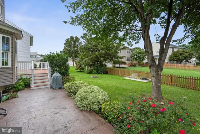 a view of a garden with a fountain