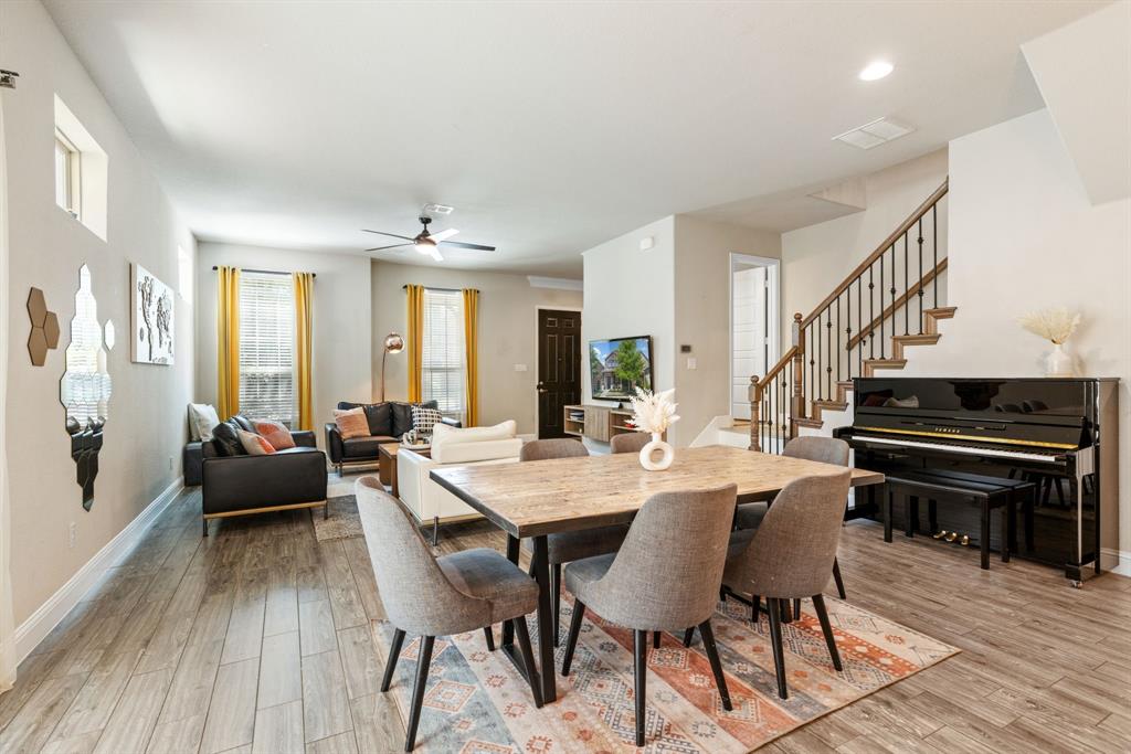 620 Ansley Way Allen, TX 75013 - Photo 11 of 31 a view of a dining room with furniture and wooden floor