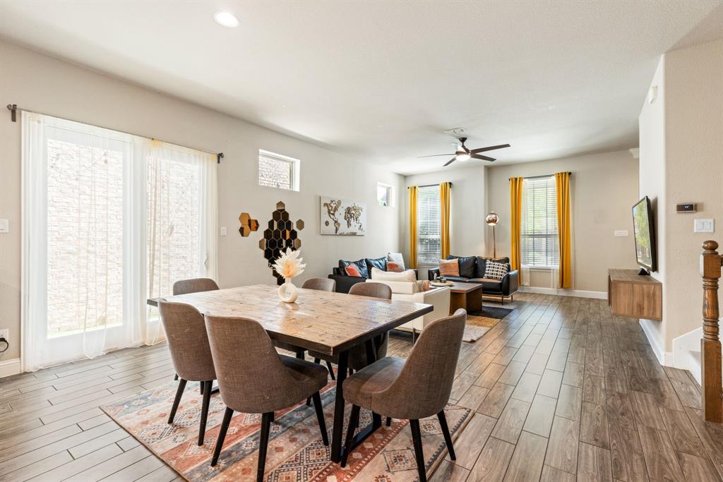 620 Ansley Way Allen, TX 75013 - Photo 10 of 31 a view of a dining room with furniture and wooden floor