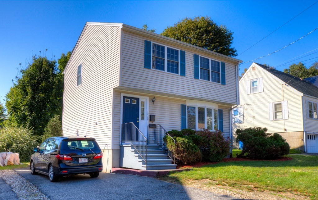1278 Trapelo Road Waltham, MA 02451 - Photo 1 of 42 a front view of a house with a yard