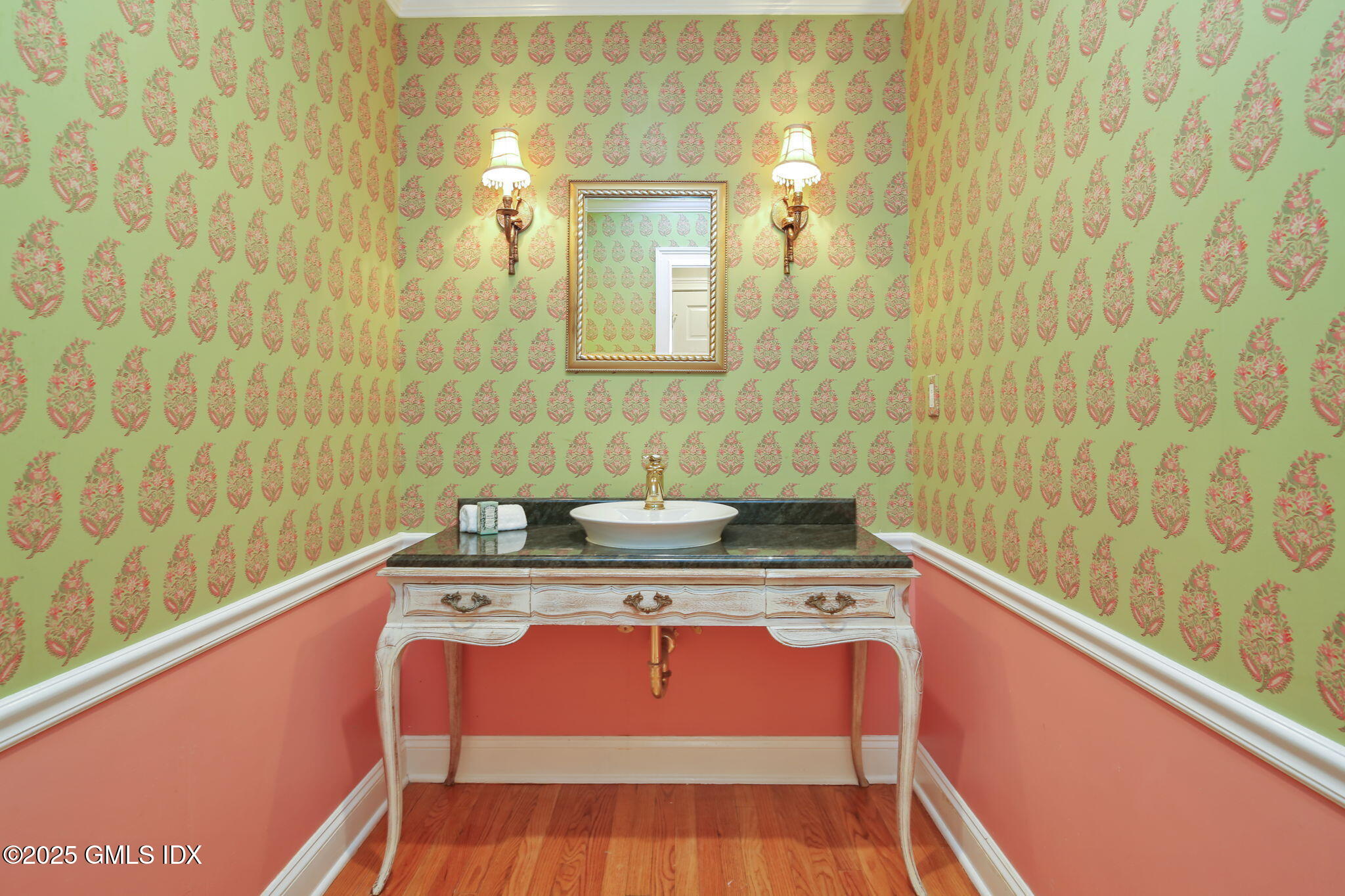 7 Pleasant View Place Old Greenwich, CT 06870 - Photo 11 of 22 a view of a bathroom with a sink and a mirror