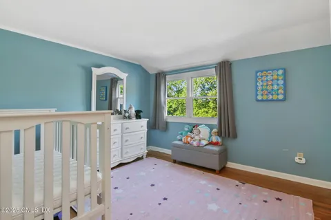 a living room with furniture and window