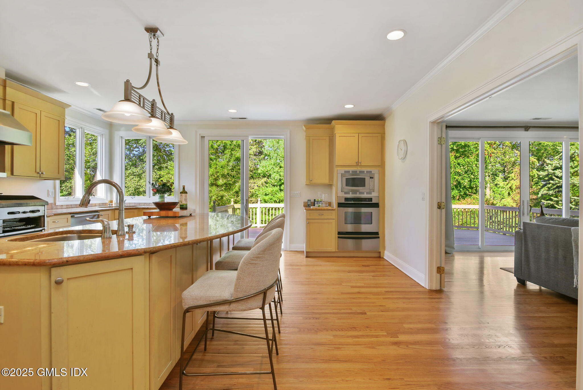7 Pleasant View Place Old Greenwich, CT 06870 - Photo 10 of 22 a dining room with stainless steel appliances granite countertop furniture and a kitchen view