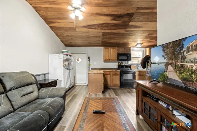 a view of a house with basketball court