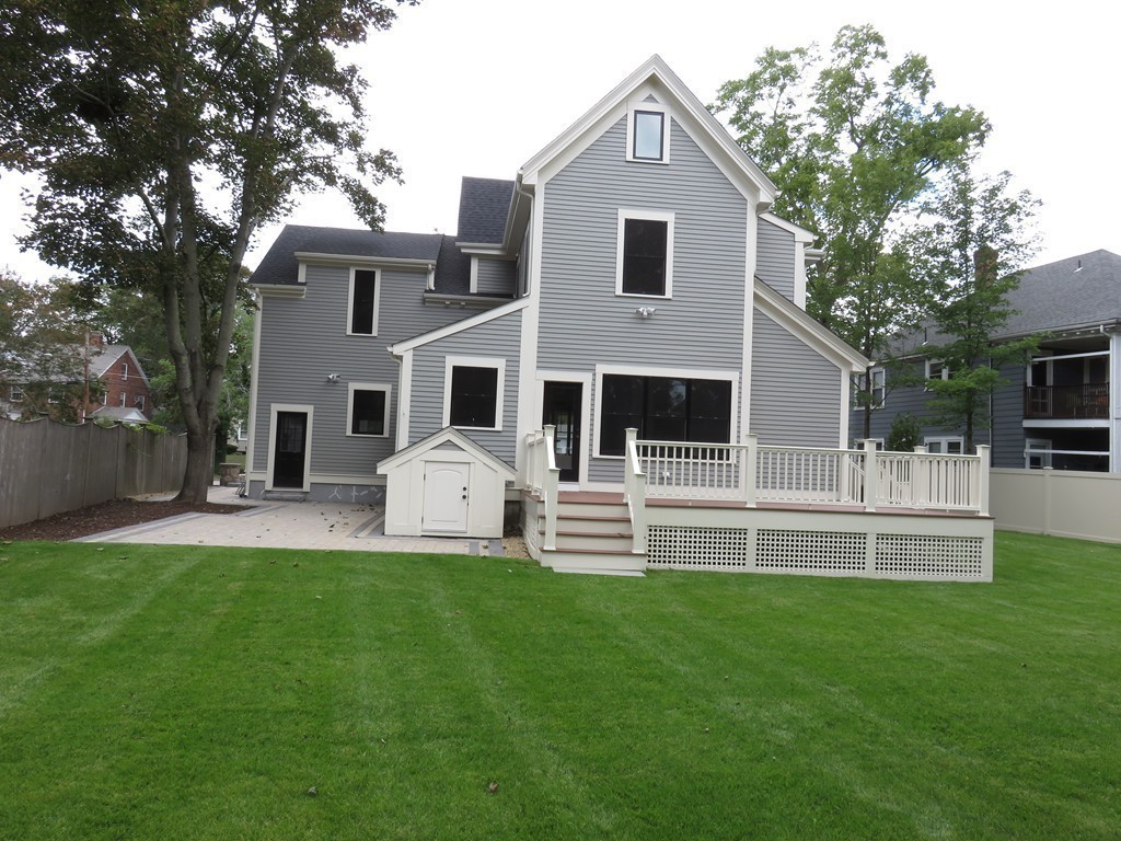 12 Maple Street Newton, MA 02466 - Photo 26 of 28 a front view of a house with a yard