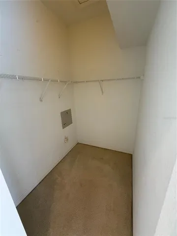 a view of a room with racks on the wall