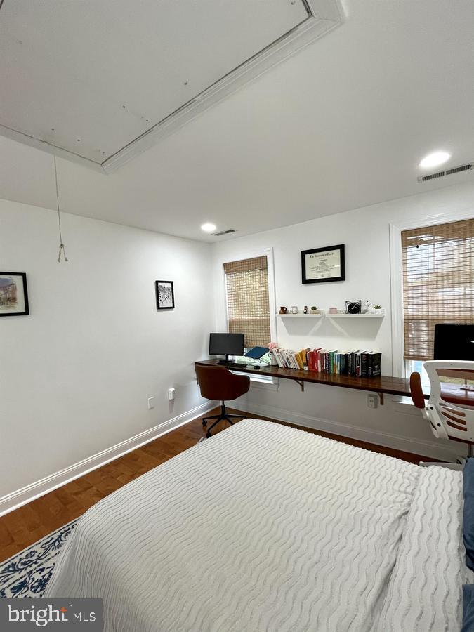 1656 Kramer Street Northeast Washington, DC 20002 - Photo 13 of 29 a bedroom with a bed and window