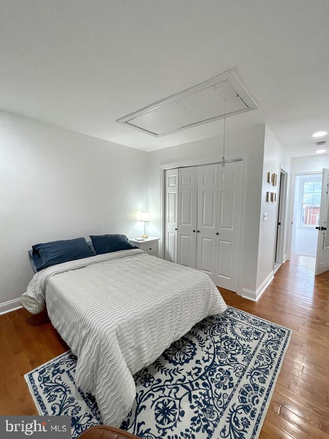 1656 Kramer Street Northeast Washington, DC 20002 - Photo 15 of 29 a bedroom with a large bed and a rug
