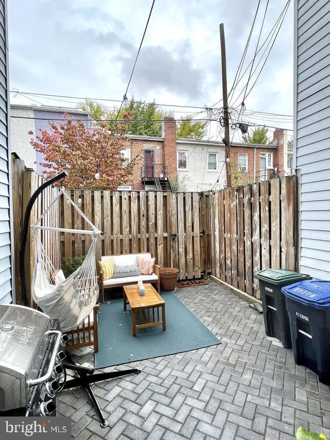 1656 Kramer Street Northeast Washington, DC 20002 - Photo 28 of 29 a outdoor space with patio couch and chairs