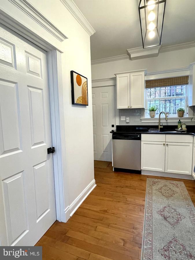 1656 Kramer Street Northeast Washington, DC 20002 - Photo 7 of 29 a kitchen with stainless steel appliances granite countertop a sink and a cabinets