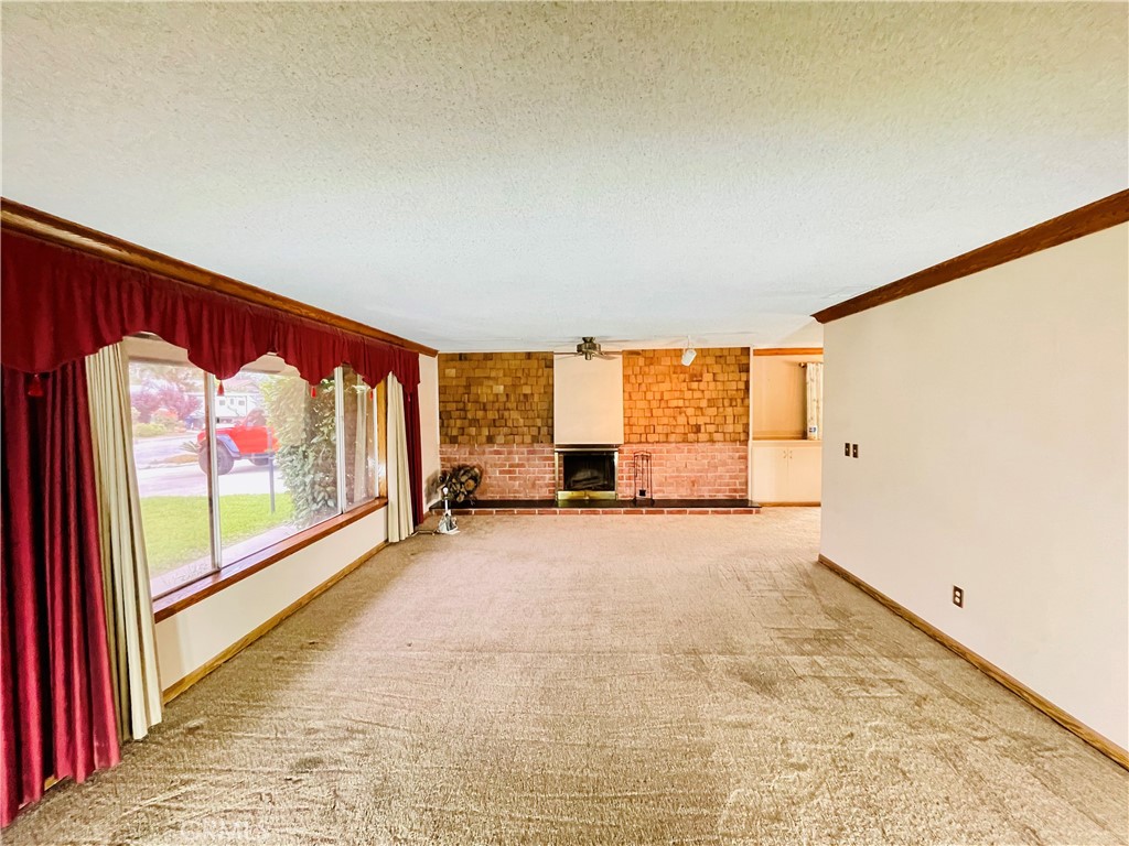 5875 Olive Avenue Rialto, CA 92377 - Photo 19 of 54 a view of an empty room with a window