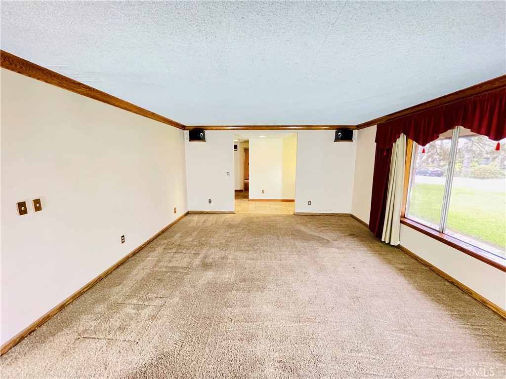 5875 Olive Avenue Rialto, CA 92377 - Photo 20 of 54 an empty room with large window