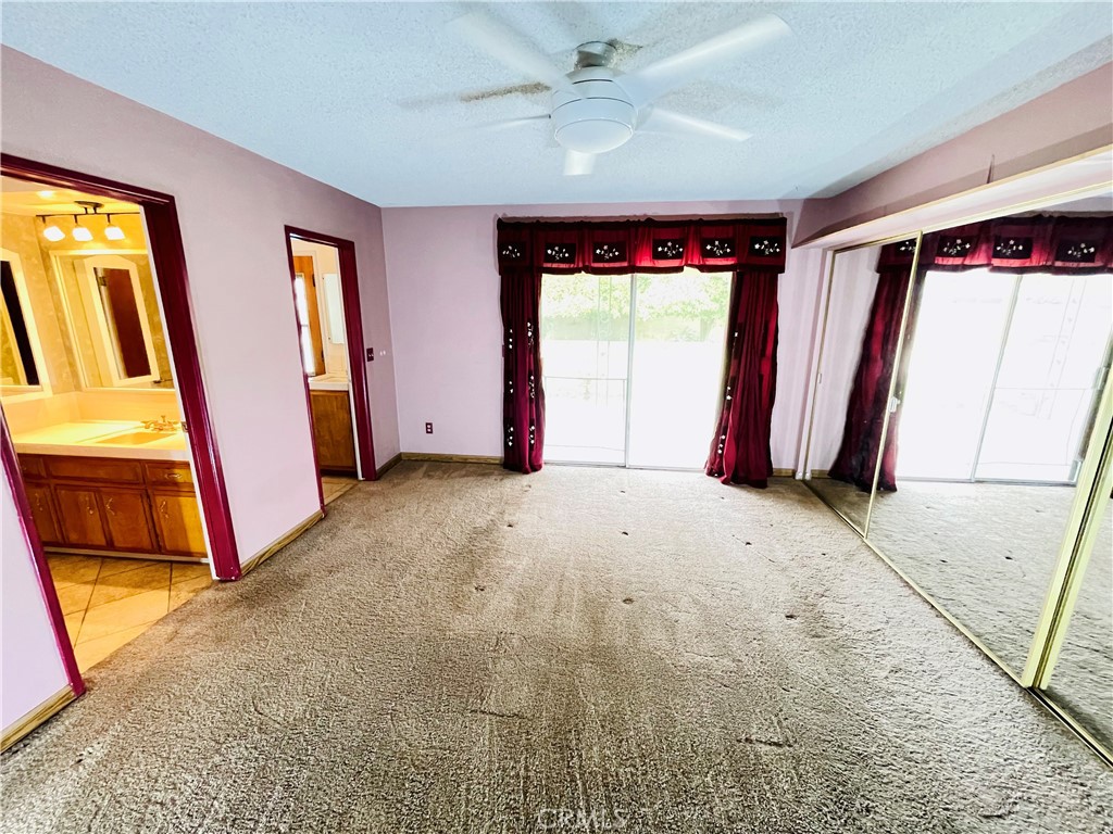 5875 Olive Avenue Rialto, CA 92377 - Photo 31 of 54 a view of an empty room with a window