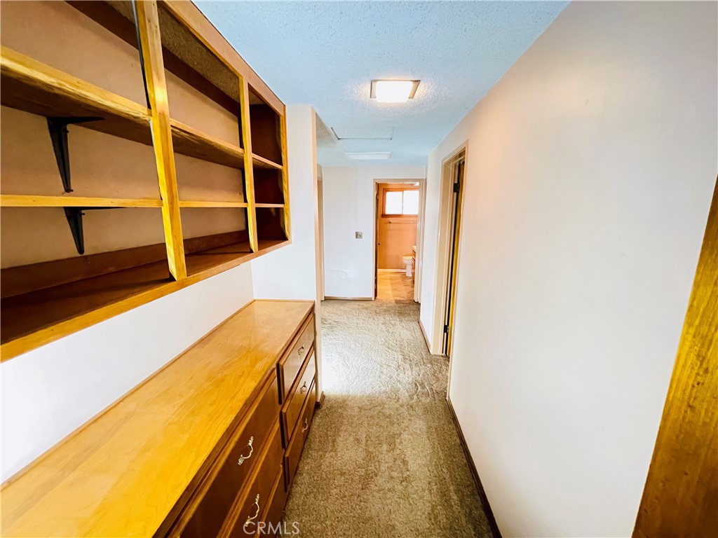 5875 Olive Avenue Rialto, CA 92377 - Photo 34 of 54 a bathroom with a bathtub and a window