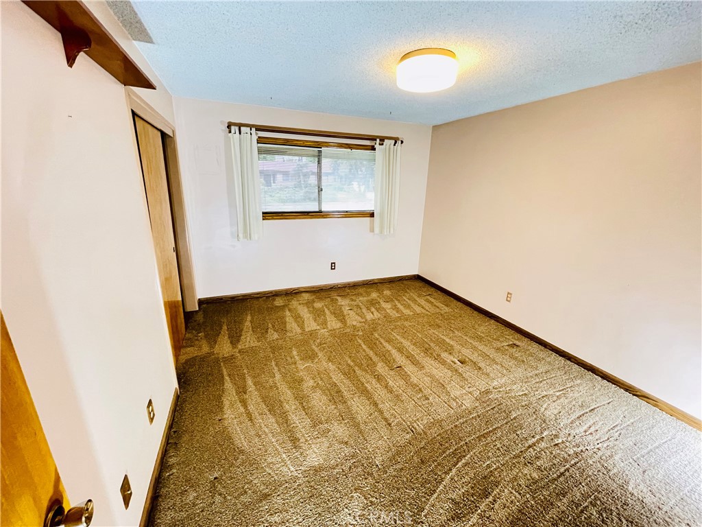 5875 Olive Avenue Rialto, CA 92377 - Photo 36 of 54 a view of an empty room with a window