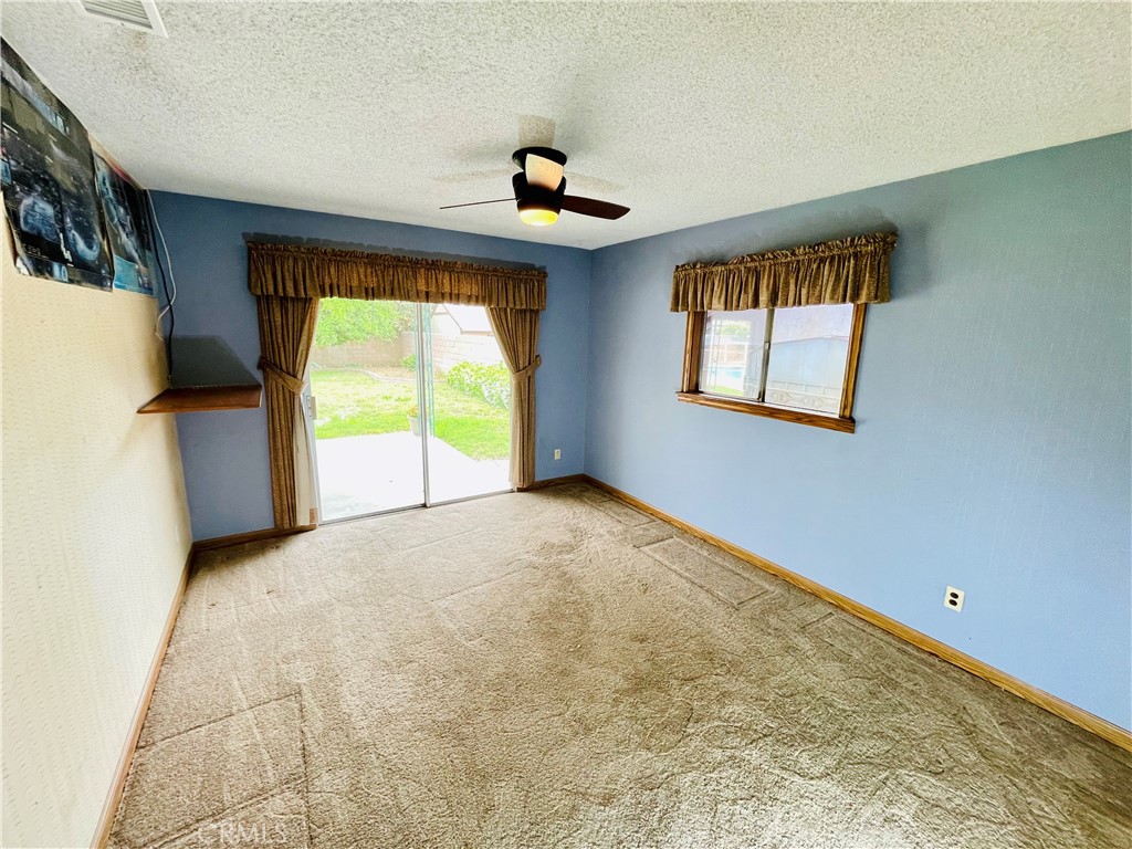 5875 Olive Avenue Rialto, CA 92377 - Photo 42 of 54 a view of an empty room with a window