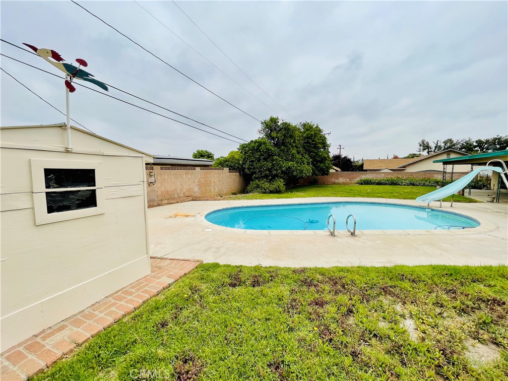 5875 Olive Avenue Rialto, CA 92377 - Photo 53 of 54 a view of a swimming pool with an outdoor space