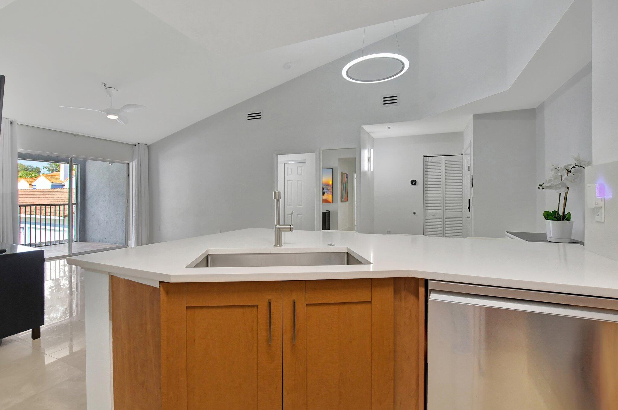 3209 Clint Moore Road, Unit 205 Boca Raton, FL 33496 - Photo 6 of 46 Stainless sink and DW
