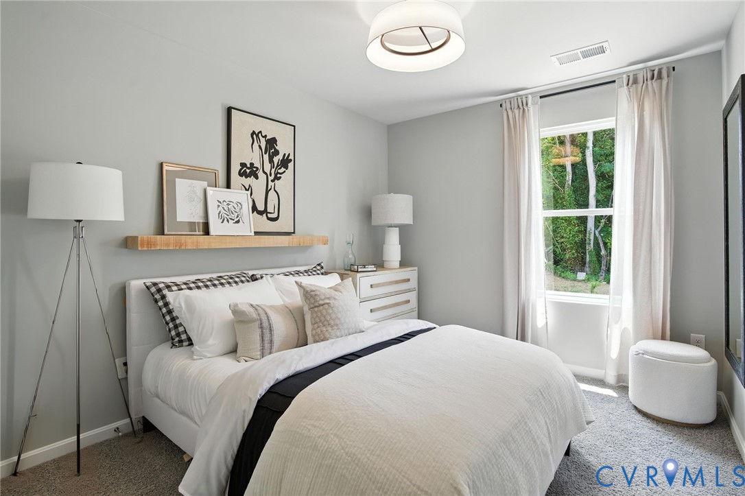 3501 Perrins Hill Way Prince George, VA 23875 - Photo 3 of 27 a bedroom with a bed and a window