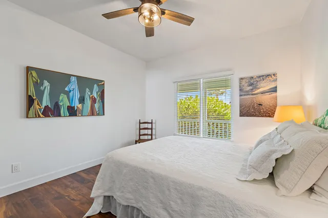 a view of walk in closet with clothes
