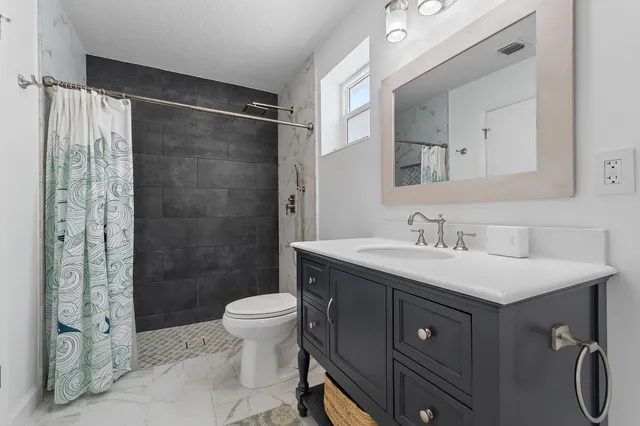 a view of a room with furniture