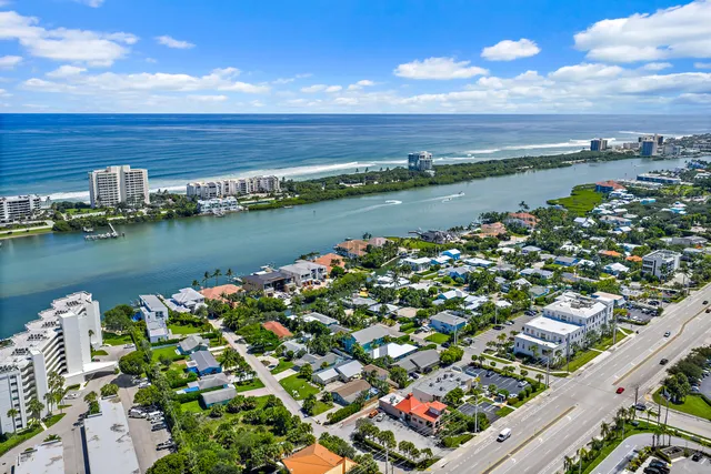 a picture of a wall with a white building