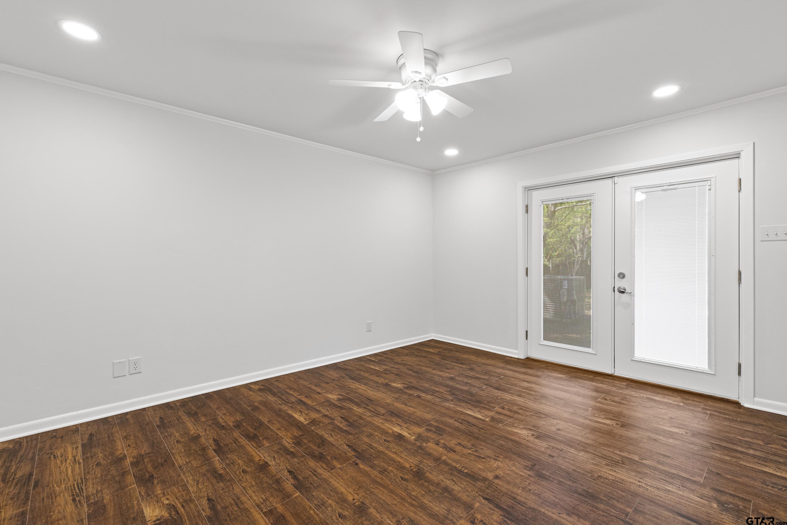 7 Lindsey Lane Longview, TX 75601 - Photo 28 of 36 an empty room with wooden floor and window