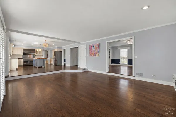 a view of a livingroom with wooden floor