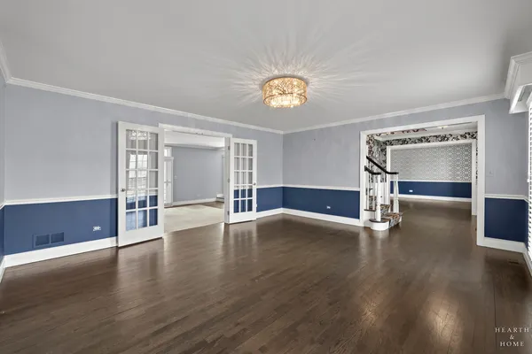 a view of empty room with a fireplace