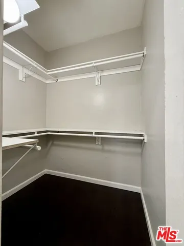 a view of an empty walk in closet