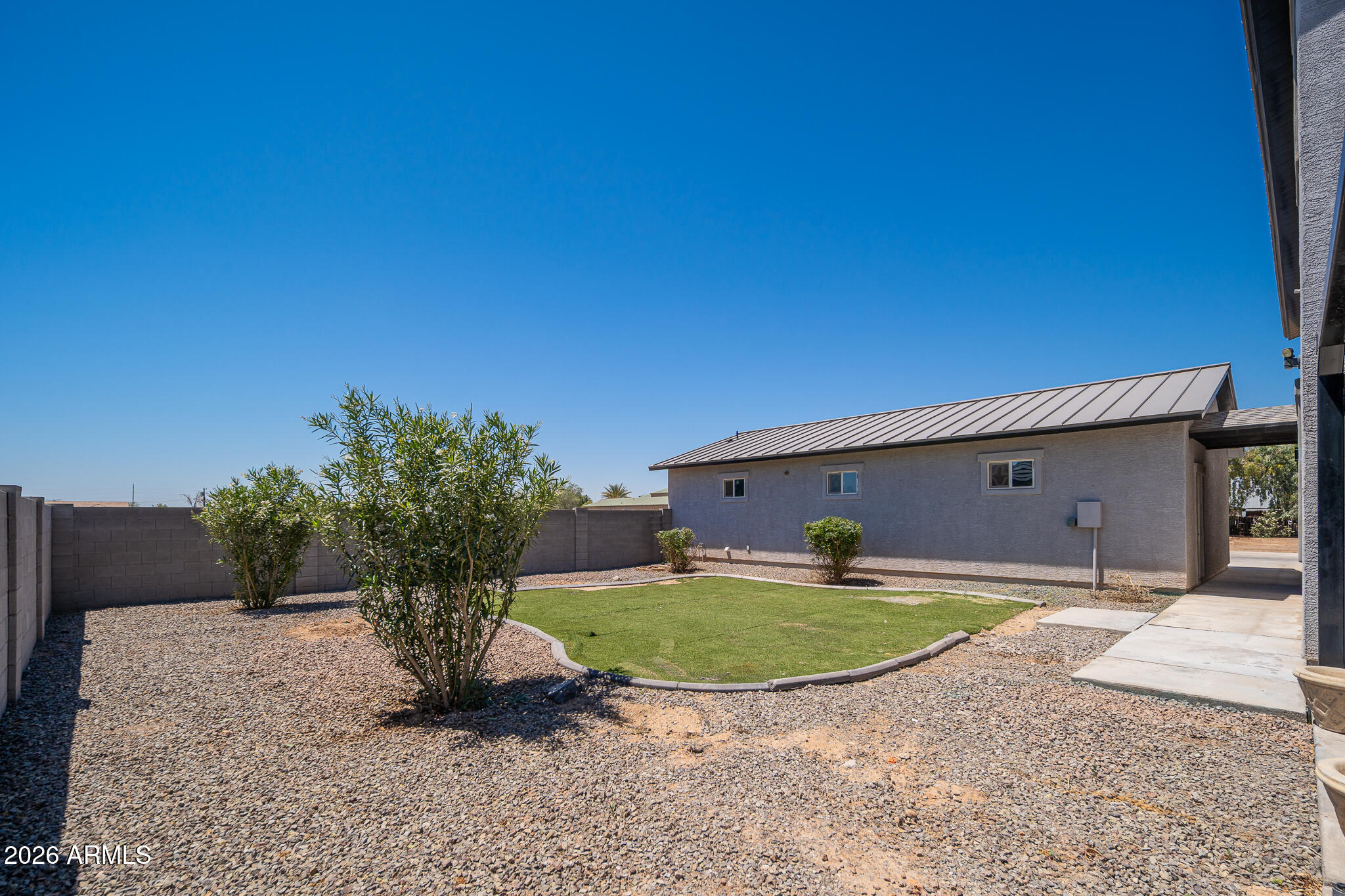 12945 West Varney Road El Mirage, AZ 85335 - Photo 69 of 70 EAST BACK YARD