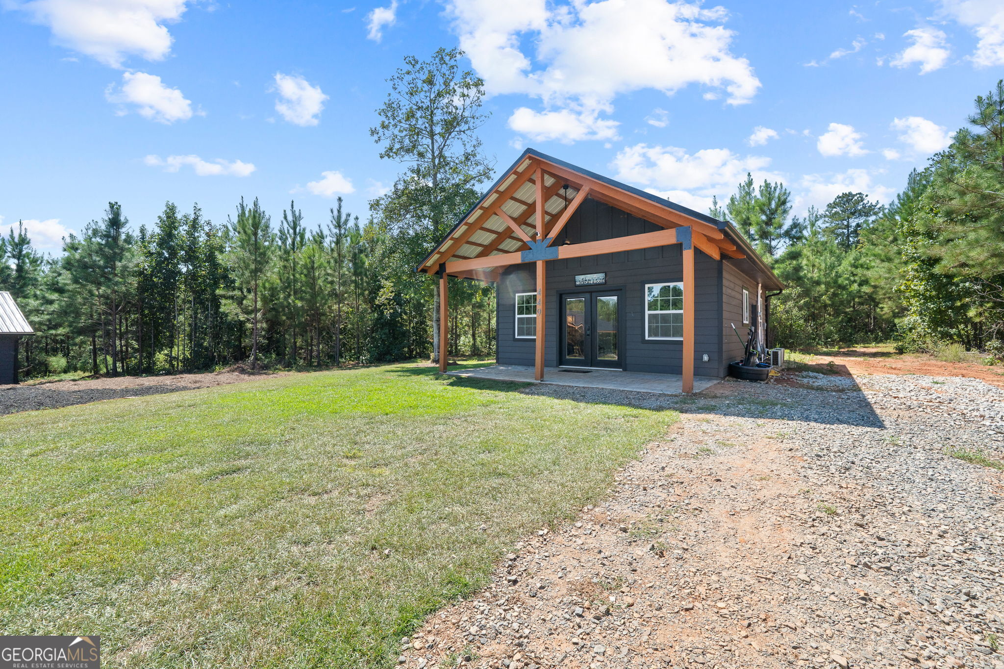 445 Avant Road Eatonton, GA 31024 - Photo 1 of 1 a view of a house with a yard