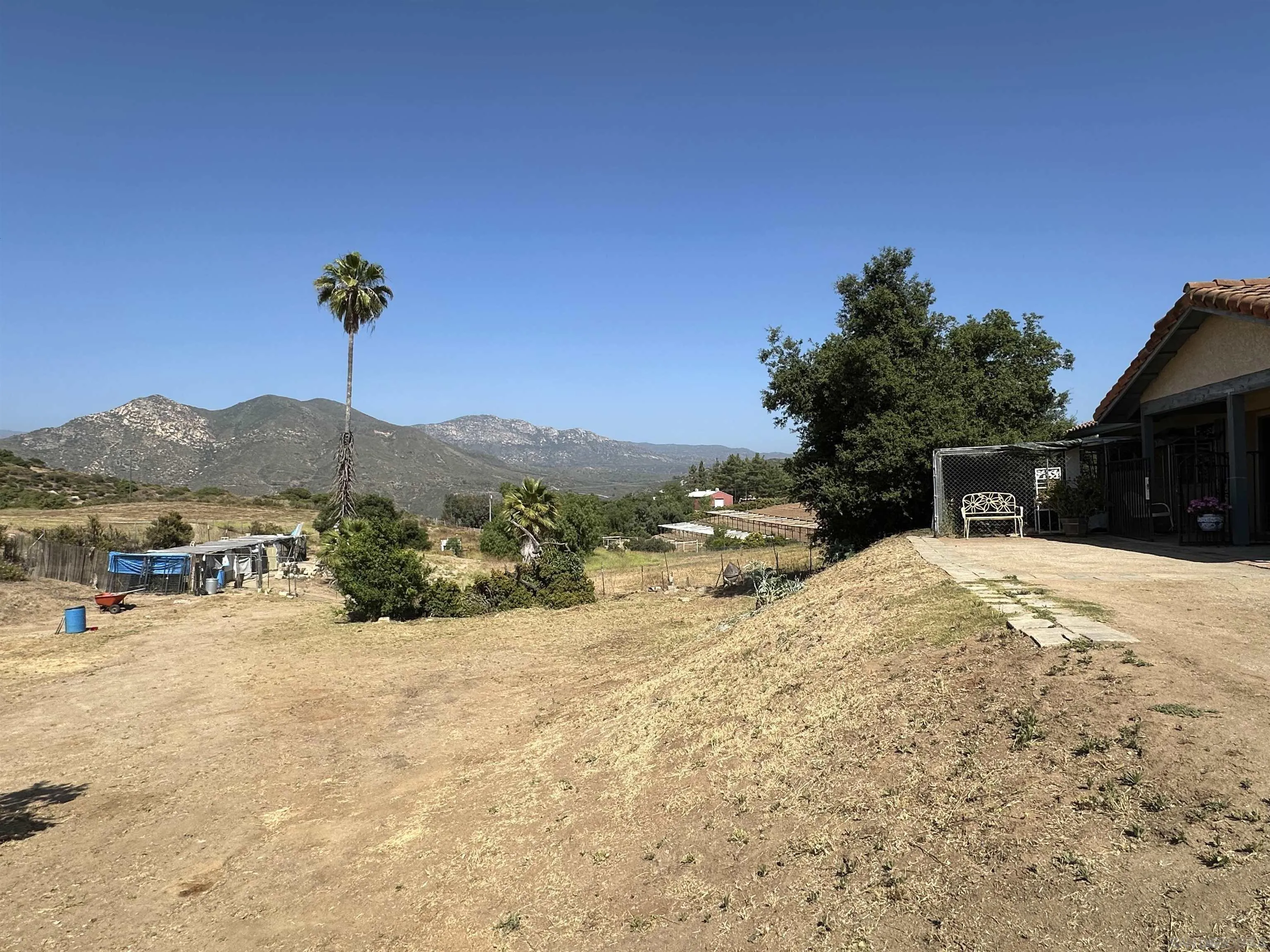 31440 Valley Center Road Valley Center, CA 92082 - Photo 3 of 28 a view of a backyard of a house