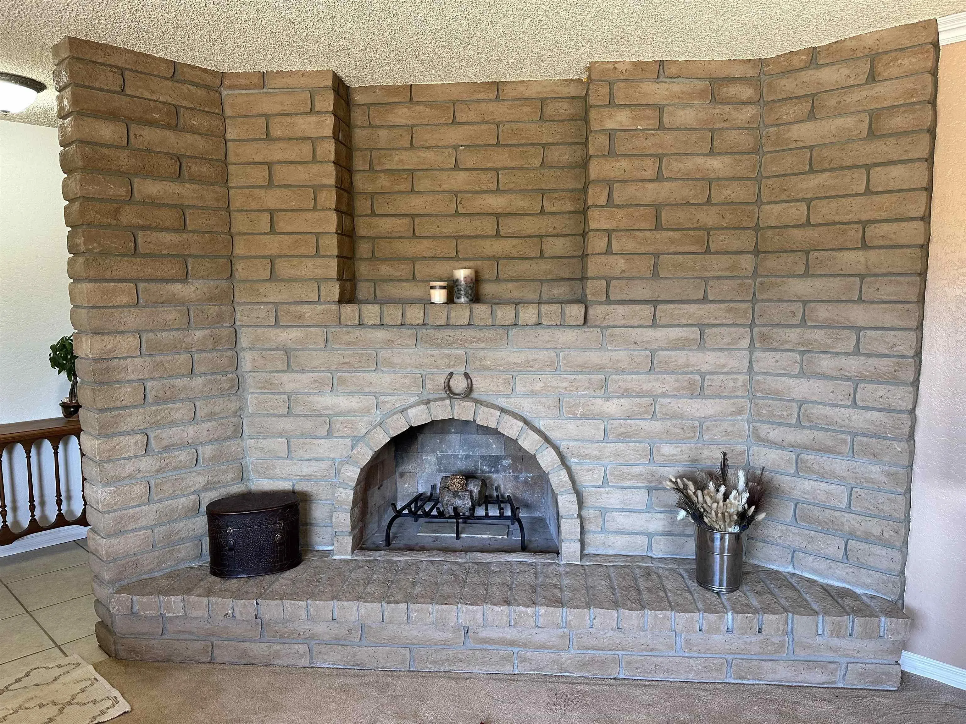 31440 Valley Center Road Valley Center, CA 92082 - Photo 7 of 28 a view of livingroom and fireplace with wooden floor