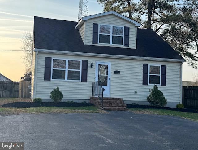 12304 Willow Grove Road Camden, DE 19934 - Photo 1 of 1 a front view of a house with a yard