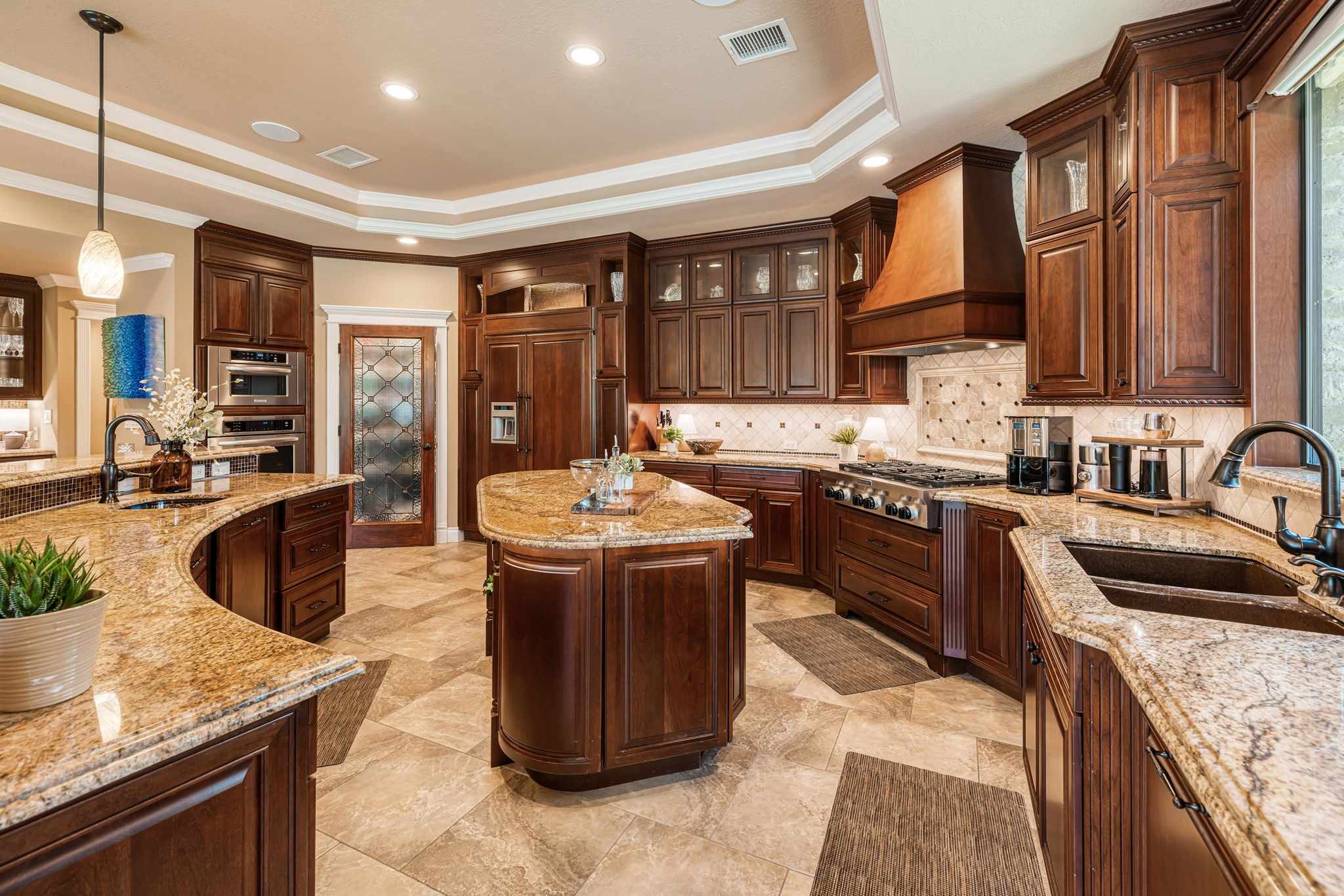 15628 Latson Street Houston, TX 77069 - Photo 16 of 50 a kitchen with a stove sink and cabinets