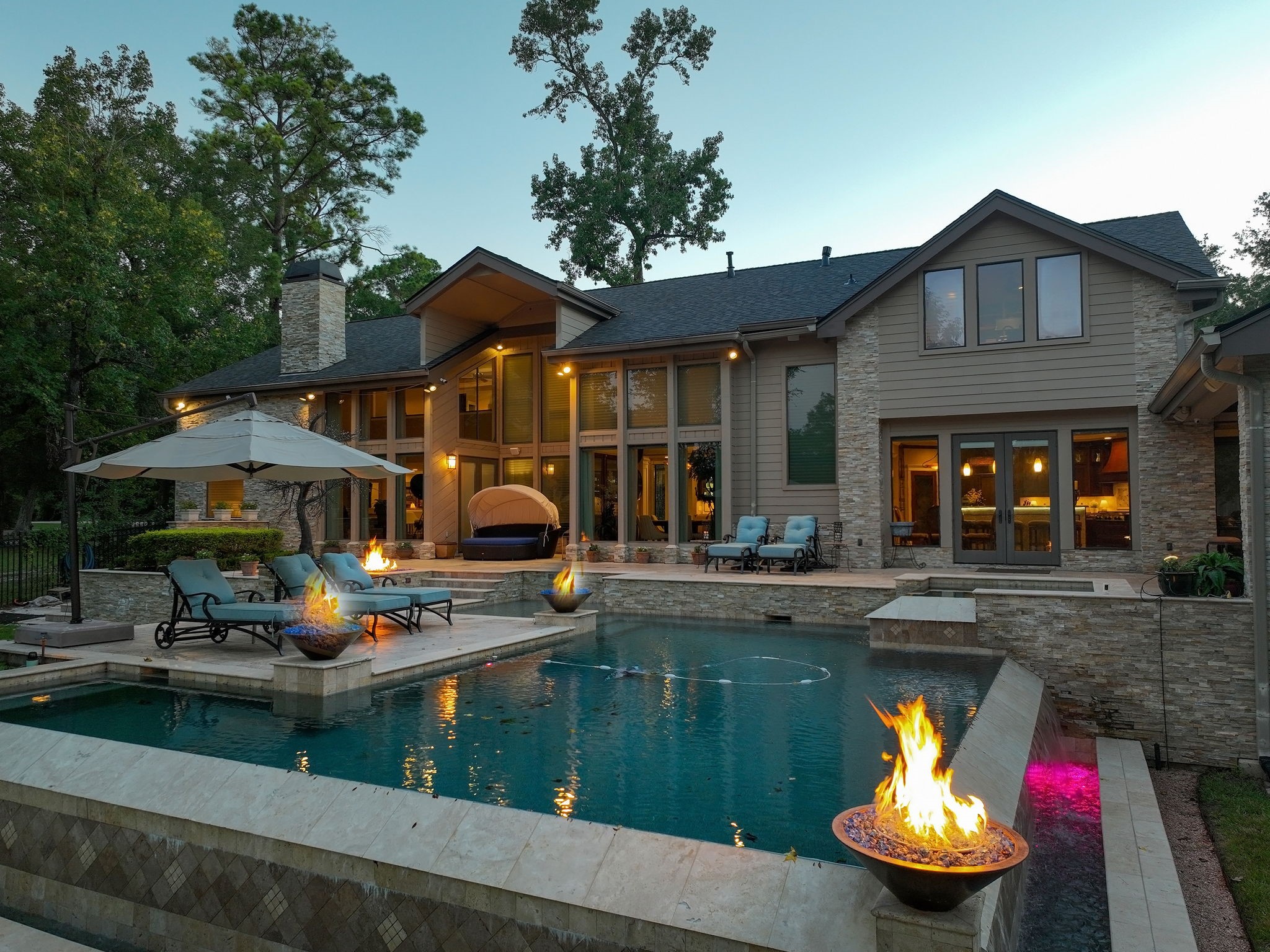 15628 Latson Street Houston, TX 77069 - Photo 2 of 50 a swimming pool view with a seating space and a water view