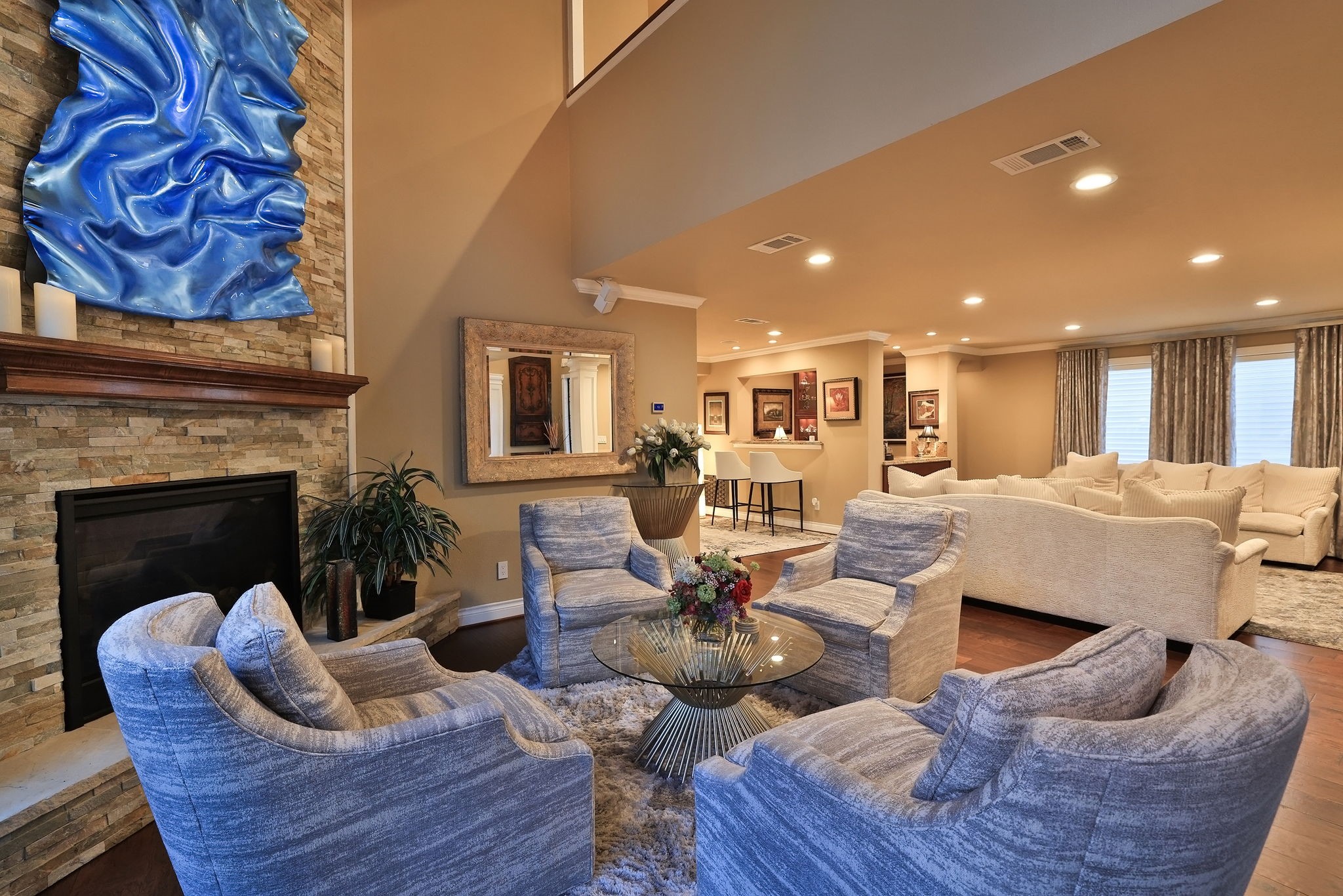 15628 Latson Street Houston, TX 77069 - Photo 25 of 50 a living room with furniture kitchen view and a fireplace