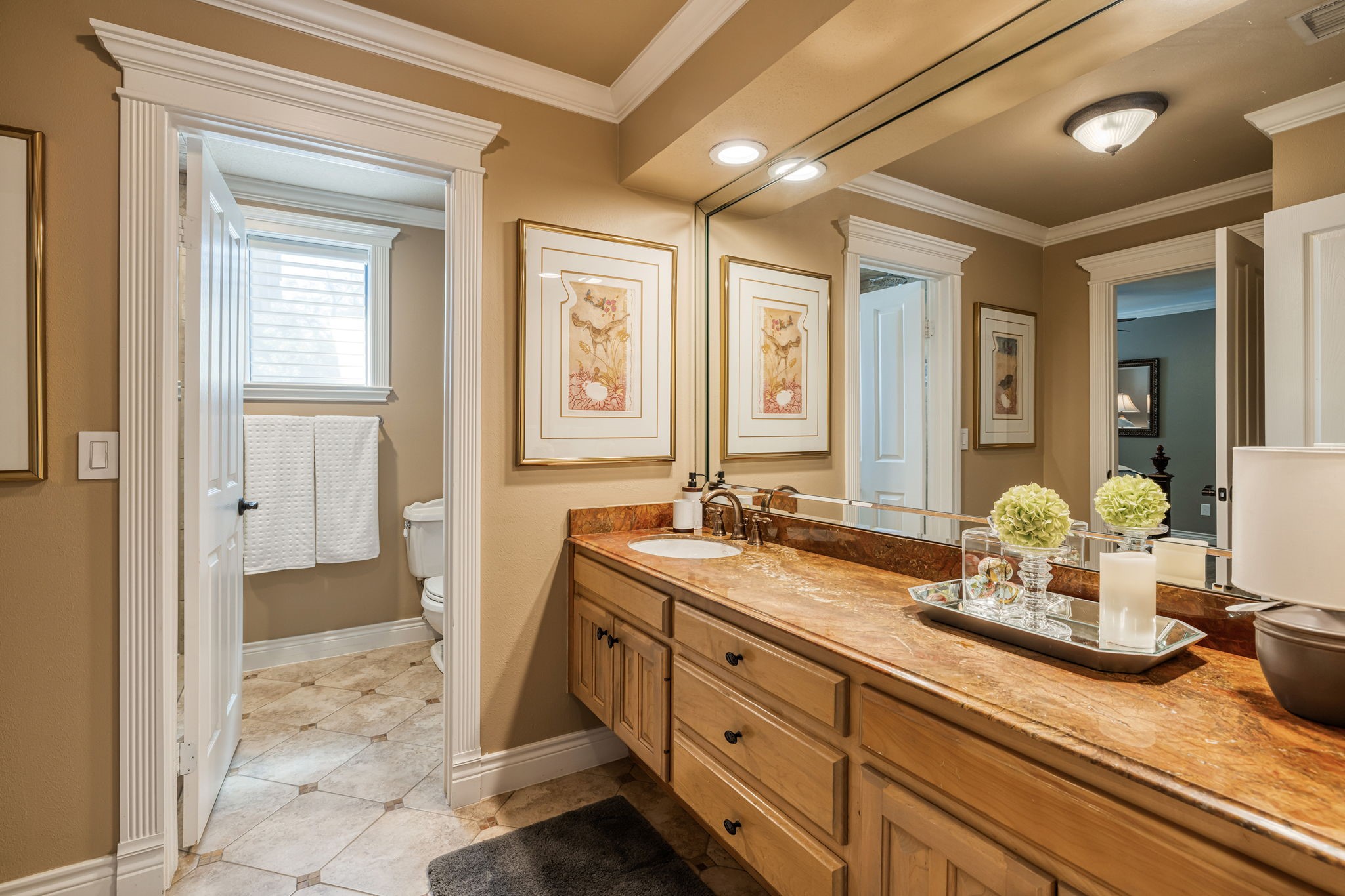 15628 Latson Street Houston, TX 77069 - Photo 34 of 50 a bathroom with a sink double vanity granite tub shower and a mirror