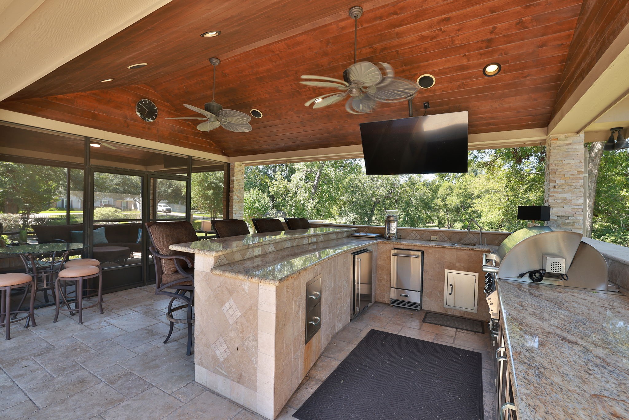 15628 Latson Street Houston, TX 77069 - Photo 44 of 50 a kitchen with stainless steel appliances granite countertop a stove and a refrigerator