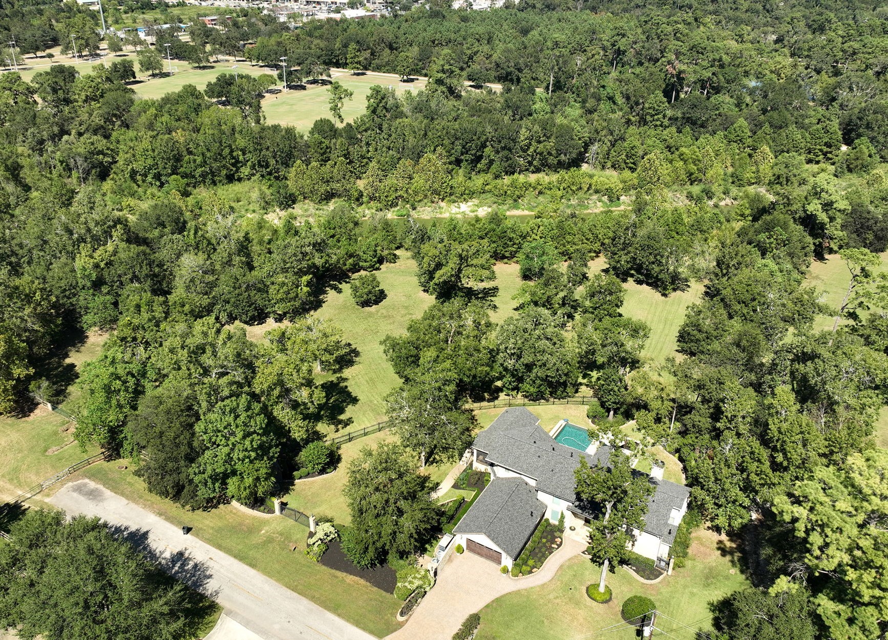 15628 Latson Street Houston, TX 77069 - Photo 50 of 50 an aerial view of a house with a yard