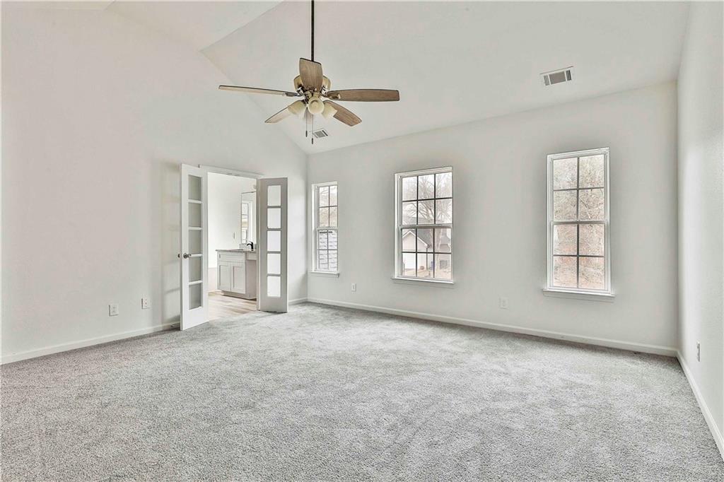 4605 Raven Wood Loop Union City, GA 30291 - Photo 16 of 24 wooden floor in an empty room with a window